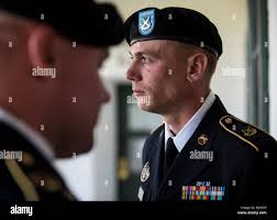 Sgt. Matthew Meyers, a U.S. Army Reserve military police Soldier with the  443rd Military Police Company, headquartered in Owings Mills, Maryland,  from Franklin, New Jersey, waits before a presentation board presided by