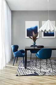 These dark elements are complemented by the white dining chairs, area rug, and the framed artworks of the walls. How To Match A Dining Table With The Right Chairs Tlc Interiors