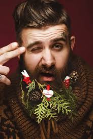 Funny bearded man in a New Years image with snow and decorations
