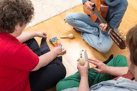 Learning a cool 80s song with a group of autistic and emotional and behavioral students. 12 Songs Every Music Therapist Should Know
