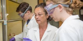 Dr. Adina Dumitrascu and her interns are developing new chemistries and  materials for redox flow batteries, which could someday be used for massive  electrical energy storage. Students are Ethan Bruce (Midland High),
