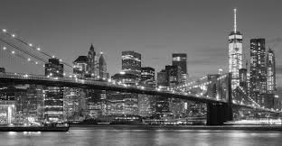 Photography of black concrete bridge and city building during night time. Brooklyn Bridge New York City Wallpaper Wall Mural