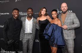 For his role as randall. Sterling K Brown Is Handsome In Bold Burgundy Blazer Alongside Wife Ryan Michelle Bathe At Emmys Daily Mail Online