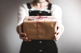 With tenor, maker of gif keyboard, add popular gift animated gifs to your conversations. Person Showing Brown Gift Box Photo Free Christmas Image On Unsplash