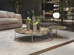 Round tables are easy to move around while square tables pair well with sectionals. Circle Coffee Table By Giulio Marelli Homkw