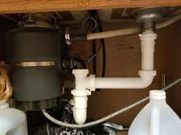 Pictures of under kitchen sink plumbing no garbage disposal. Need Some Help Not Sure What S Up With This When The Dishwasher Runs The Sink Above The Disposal Fills Up With Waste Water Just Moved In And No Idea What To Do