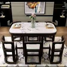 Outfit your dining space with small dining room furniture. These Space Saving Tuck Under Dining Tables Are Perfect For Tiny Homes Or Apartments