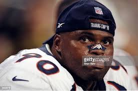 Defensive end Neil Smith of the Denver Broncos looks