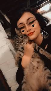 Rumor the dog disapproves of being held