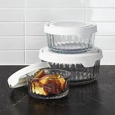 These products feature durable glass bottoms under sturdy plastic lids. Anchor Hocking Embossed Glass 6 Piece Food Storage With Trueseal White Lids Crate And Barrel Glass Food Storage Containers Glass Food Storage Storage Bowls