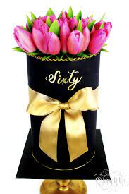 Carnations, tulips, and lilies are popular mother's day flowers, or try mixing some of her favorite garden flowers into an arrangement of daisies and wildflowers! Triple Barrel Fondant 60th Birthday Flower Box Cake With Beautiful Bright Pink Tulips Gold Bo 60th Birthday Cake For Ladies 60th Birthday Cakes Gorgeous Cakes