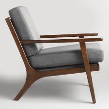 Textured Gray Cushions With A Subtle Two Tone Weave Pop Against A Sleek Wood Frame Finished In World Market Chair Mid Century Chair Cushions Living Room Chairs
