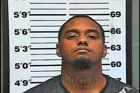 NEW: Two people have been arrested in connection to a homicide that  happened at an Edmond McDonald's back