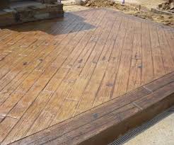 Looks like a deck but it is a wonderfully crafted boardwalk/wood plank textured concrete stamped patio sure to turn some heads armed with questions. Stamped Concrete Cold Lake Superb Concrete Building Construction Ltd Superb Concrete Building Construction
