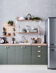Beautiful canadian maple kitchen with star of galaxy granite worktops and island unit. 25 Chic And Lively Green Kitchens Shelterness