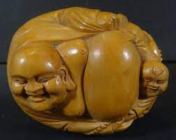 Sold at Auction: lachender Buddha mit Kind, Holz, China