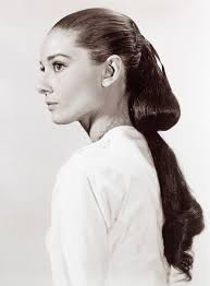 Often sorting out **Audrey Hepburn** from a random old photo where she  chats with others can give you a poster. This is how her unique beauty is.  This happened in this