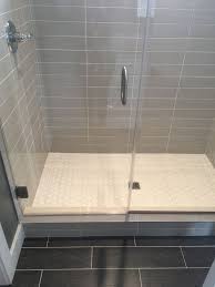 Learning how to tile a subway shower is simple, once you learn the basics. Gray 4x16 Subway Tile Stacked With White Hex Shower Floor And Wood Look Floor Tile Superior Development Llc Subway Tile Showers Shower Tile Shower Floor