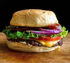 Keep the grill going because this stuffed cheeseburger recipe makes enough for a crowd. Hamburgers Diner Style Recipe Eat Your Books Recipes Hamburger Perfect Hamburger