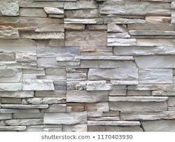 Stone Background Walls Are Stacked Stone Cladding Background And Wallpaper Exterior Wall Cladding Cladding Wall Cladding Tiles