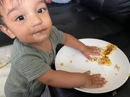 How to keep baby still in high chair?