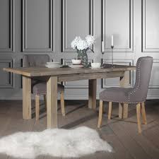 Take this table, for example, a lean design, it is crafted from a combination of solid and manufactured wood in a brown and gray finish. Brook Grey Upholstered Dining Chairs Pair Modish Living