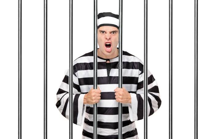 216 Prisoner Standing Behind Bars Stock Photos - Free & Royalty-Free Stock Photos from Dreamstime
