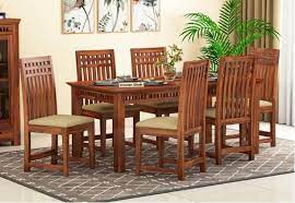 The leg frame recalls that of a refectory table and includes a brushed brass detail on the cross beam. 6 Seater Dining Table Set Buy Dining Table Set 6 Seater Upto 70 Off