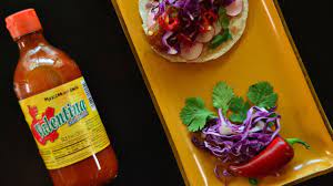 That tangy, slightly spicy white sauce that often accompanies baja style fish tacos is usually made with sour cream, mayonnaise, and lime juice. How To Pair Tacos With The Right Hot Sauce According To A Tacologist Food Wine