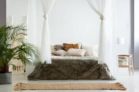 The requirements to build this design are wood for the bed and headboard, cut them as per your measurements, drill the holes and form the feet of the bed, construct the platform, cut out the headboard panels and assemble the pieces. Diy Your Own Beautiful And Romantic Canopy Bed