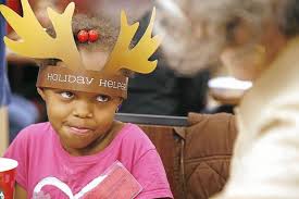 Elementary students shop with police officers, Rotarians for Christmas gifts