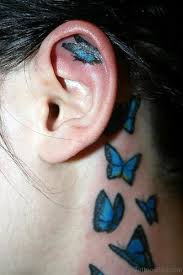Behind the ear is a very popular spot for females to get tattoos, they are usually a little bit smaller than this one but is still easy enough to cover up if you have longer hair. 97 Decent Butterfly Tattoos On Neck