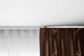 Ombre room darkening curtains for bedroom, gradient grey white to brown light blocking thermal insulated grommet window curtains /drapes for living room ,2 panels, 52x96 inches length. Brown Curtains And White Tulle On A Rail With A White Ceiling Stock Photo Picture And Royalty Free Image Image 129225389
