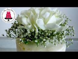 This adorable confection is designed to look like a tree with the two lovebirds' initials a cake decorated with flowers (either fresh blooms or ones sculpted from sugar) would complement the. Diy Real Flower Cake Topper For Under 10 How To With The Icing Artist Youtube