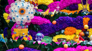Marigold garland for day of the dead, dia de los muertos altar. How Dia De Los Muertos Altars Honor Our Ancestors Teen Vogue
