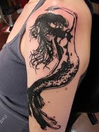 Mermaid tattoos has been known to bring luck to their wearers. Beautiful Black Ink Mermaid Tattoo On Half Sleeve Tattooimages Biz