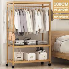 Cheaper than a standard wooden wardrobe and pot constitute easily stored by when not in you nates assemble it and invest it anywhere. China New Design Houseware Portable Bamboo Wood Clothes Rack Laundry Hanger China Clothes Rack Price