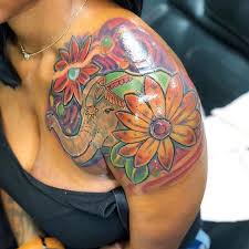 Dark Skin Tattoos Elephant And Flowers Tattoo Dark Skin Body Art Tattoo Ideas And Inspiratio Dark Skin Tattoo Skin Color Tattoos Black Girls With Tattoos