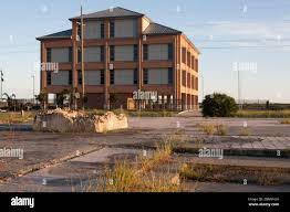 The Cameron Parish School Board building represents new construction in  Cameron since Hurricane Ike devastated the town in 2008. But many empty  slabs Stock Photo