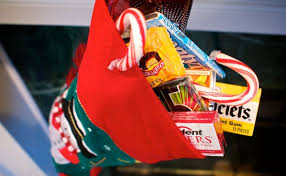 Each delicious piece of candy features a picture of jolly ol' saint nicholas in all his colorful glory, stuffed in a festive stocking and ready to go. Holiday Safety Tips For Your Dog Puppy Toob