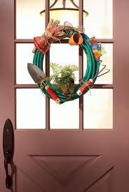 How To Make A Garden Hose Wreath Garden Hose Wreath Wreaths Whimsical Garden