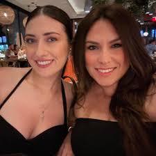 Looking for the name of the song and the artist. Let's go walking in the  park goosing statues in the dark if Joan of art can take it why can't you..  well