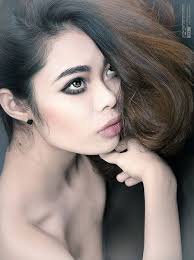 Both photos are a bit photosoped but much less than the ones