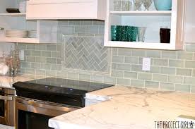Simply peel off adhesive backing and stick to your wall! Kitchen Backsplash Reveal Jenallyson The Project Girl Fun Easy Craft Projects Includ Kitchen Tile Inspiration Kitchen Tiles Backsplash Kitchen Backsplash
