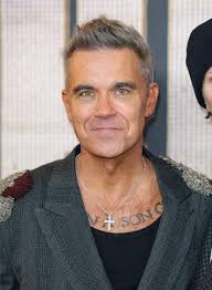 Robbie Williams photographed with his good friend (also a film director)  Stephen Ward last night… From Stephen Ward's page: 'Went to a screening of  Better Man, the highly unusual and brilliant biopic