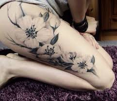 Black And White Cherry Blossom Vine Tattoo 60 Thigh Tattoo Ideas Cuded Girl Thigh Tattoos White Flower Tattoos Flower Thigh Tattoos