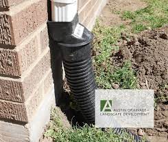 Tying your french drain into an existing downspout is another solution. What Are Three Backyard Drainage Solutions Austin Drainage Landscape Development