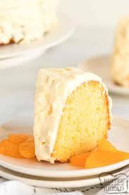 Using the pineapple juice as the liquid, stir up a box of yellow cake mix according to the box directions and pour over all. Mandarin Orange Cake With Pineapple Frosting Butter With A Side Of Bread
