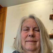 How do I get my Christmas Cactus to bloom flowers?