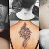 Flower back tattoo designs ideas are trendy, with different varieties, sizes, and colors. 3